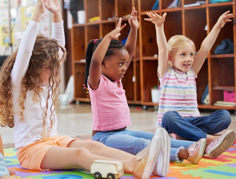 Group of Georgia Pre-K students doing music and movement as part of their Pre-K curriculum.
