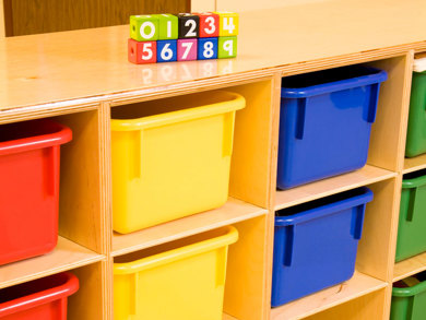 Set of colorful classroom cubbies in daycare classroom
